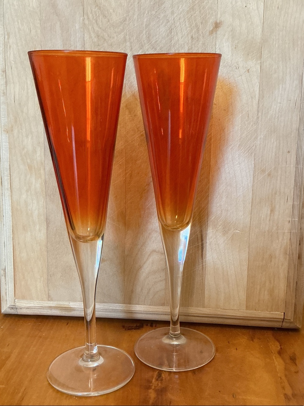 Pair Amber Orange Glass Champagne Flutes